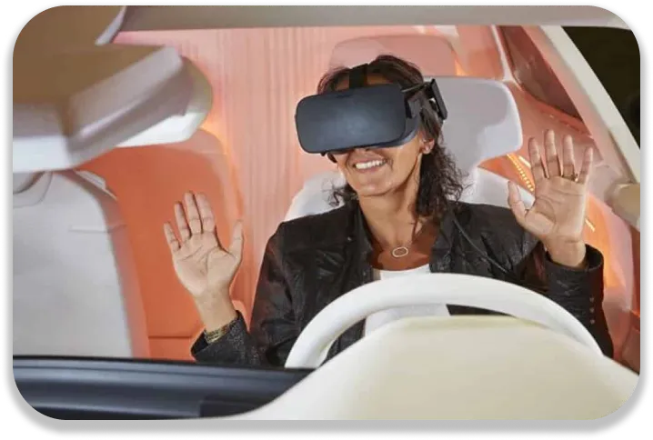 picture of someone driving with a VR headset